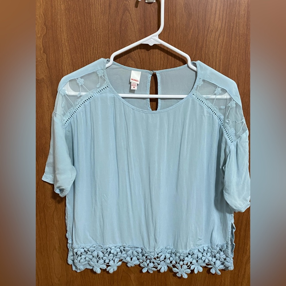 Pretty, soft, dainty, sky blue blouse.